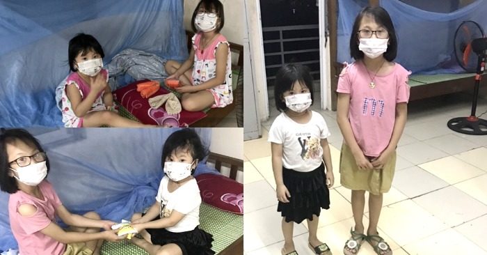 Hình ảnh của Tuyết và Mai - hai cháu bé có cha mất liên quan Covid-19, tự chăm sóc nhau trong khu vực cách ly ở Bắc Ninh